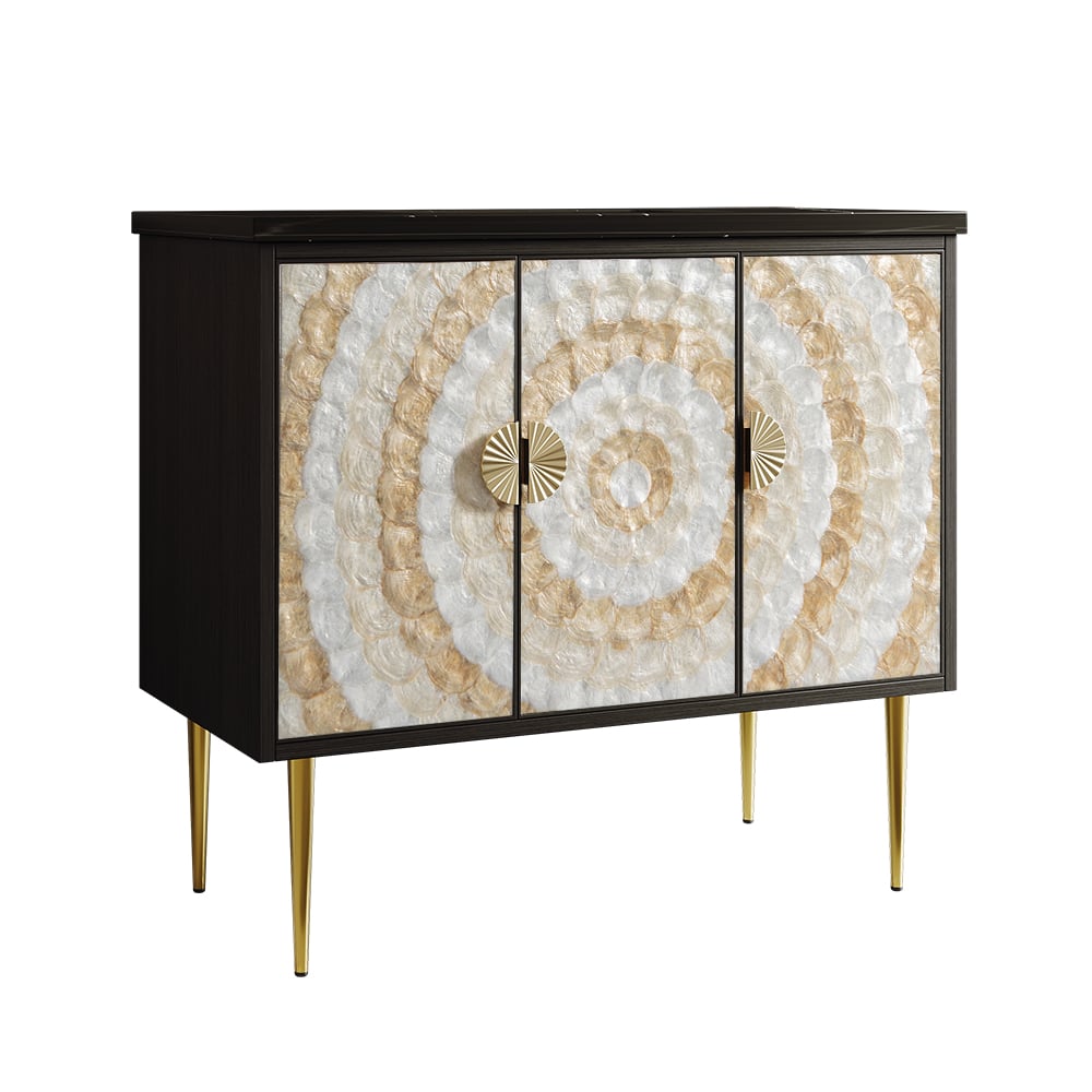 Decorative cabinet with shell-patterned doors and gold legs on a white background