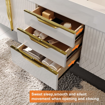White dresser with gold handles on a carpeted floor, showing open drawers.