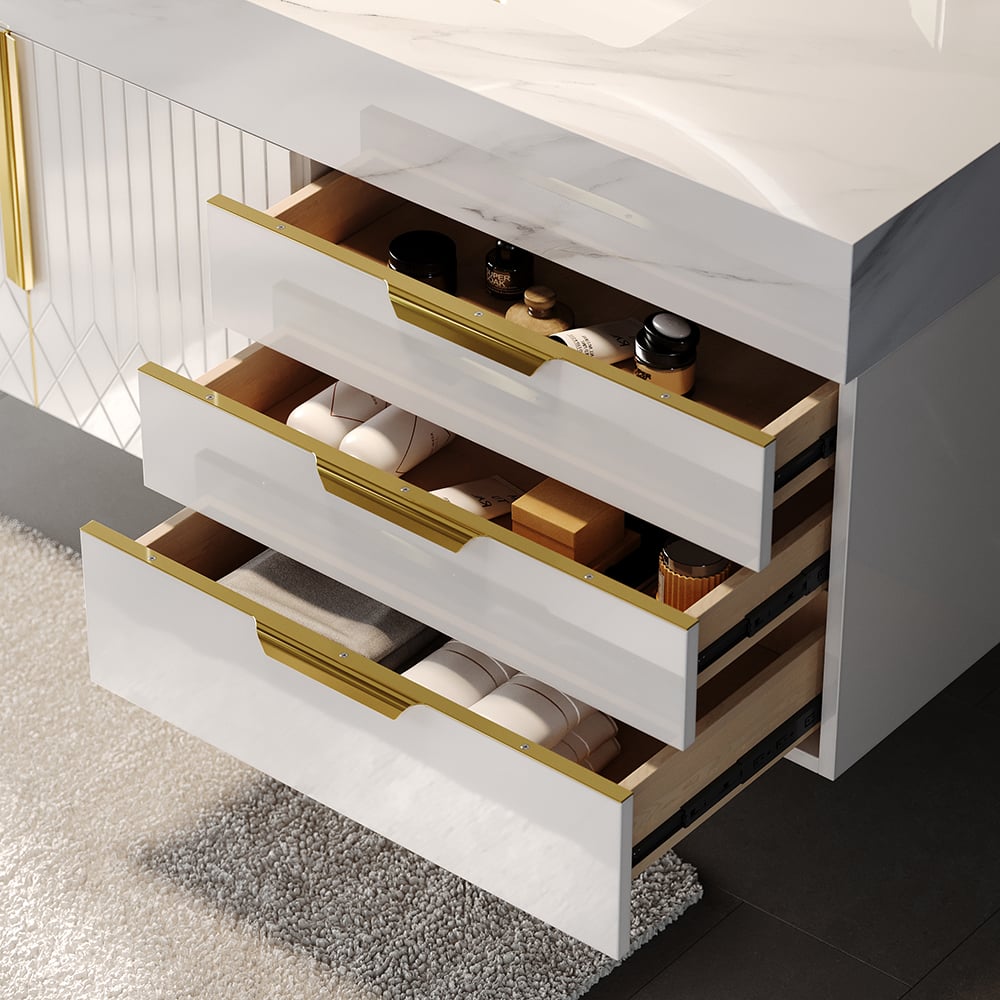 White dresser with gold handles in a modern interior setting