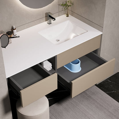 Bathroom vanity with white countertop, sink, and open drawers.