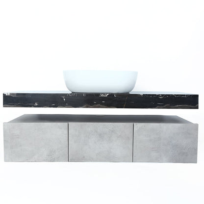 Bathroom vanity with black marble countertop and white basin on a white background