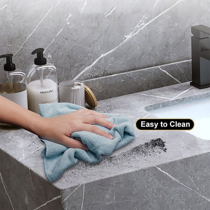 Person cleaning a bathroom counter with a blue towel, with 'Easy to Clean' text displayed.