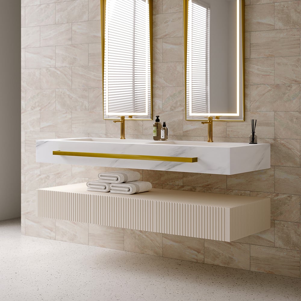 Modern bathroom vanity with marble countertop, gold fixtures, and towels.