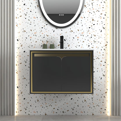 Bathroom vanity with black cabinet and round mirror on terrazzo-patterned wall.