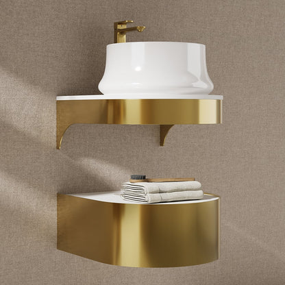 Wall-mounted sink with gold bracket and white basin against a beige wall.