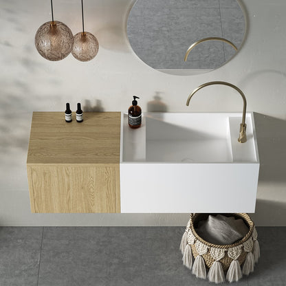 Bathroom vanity with white sink, wooden cabinet, and decorative elements.