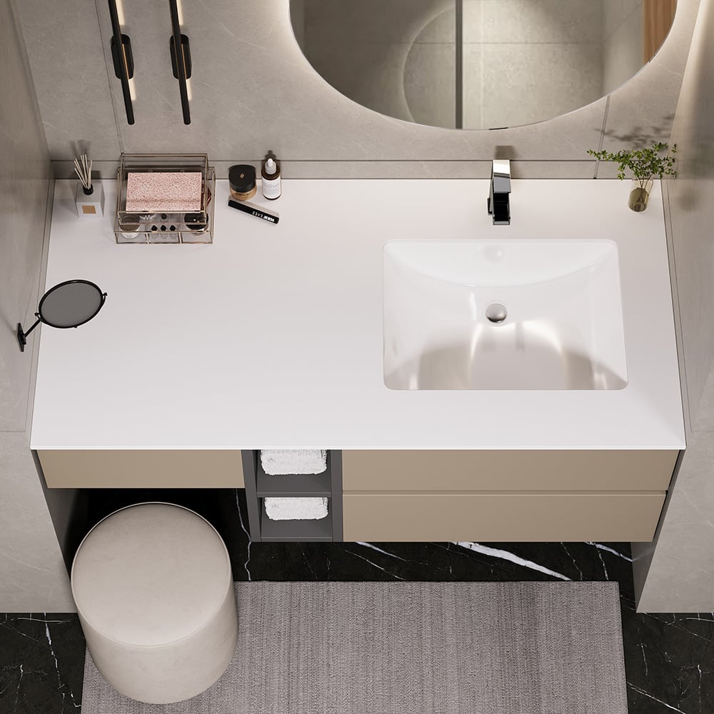 Modern bathroom vanity with sink, mirror, and toiletries.