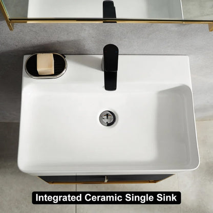 White ceramic single sink with black faucet in a bathroom setting
