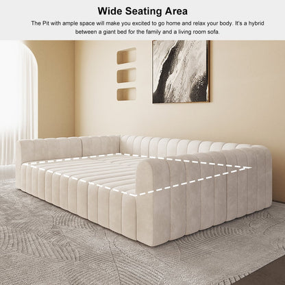 Off white sectional sofa in a room with a neutral color scheme