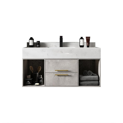Bathroom vanity with storage compartments and toiletries on a white background