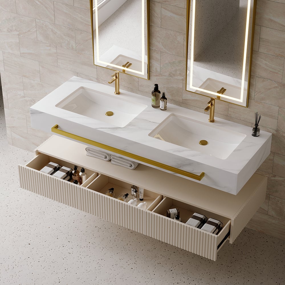 Bathroom vanity with dual sinks, gold fixtures, and open drawers.