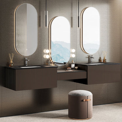Bathroom with dark wooden vanity, oval mirrors, and a small stool.