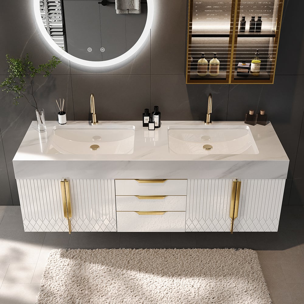 Bathroom vanity with dual sinks, gold fixtures, and a round mirror.