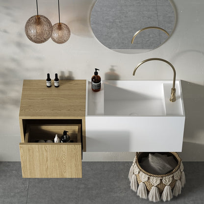 Bathroom setup with wooden vanity, white sink, and decorative elements.