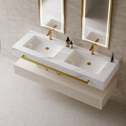Bathroom vanity with dual sinks, gold fixtures, and mirrors in a tiled bathroom.