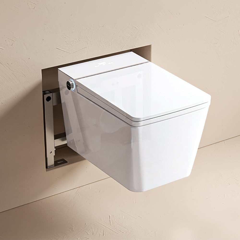 Wall-mounted white toilet bowl with silver flush mechanism on a beige wall.