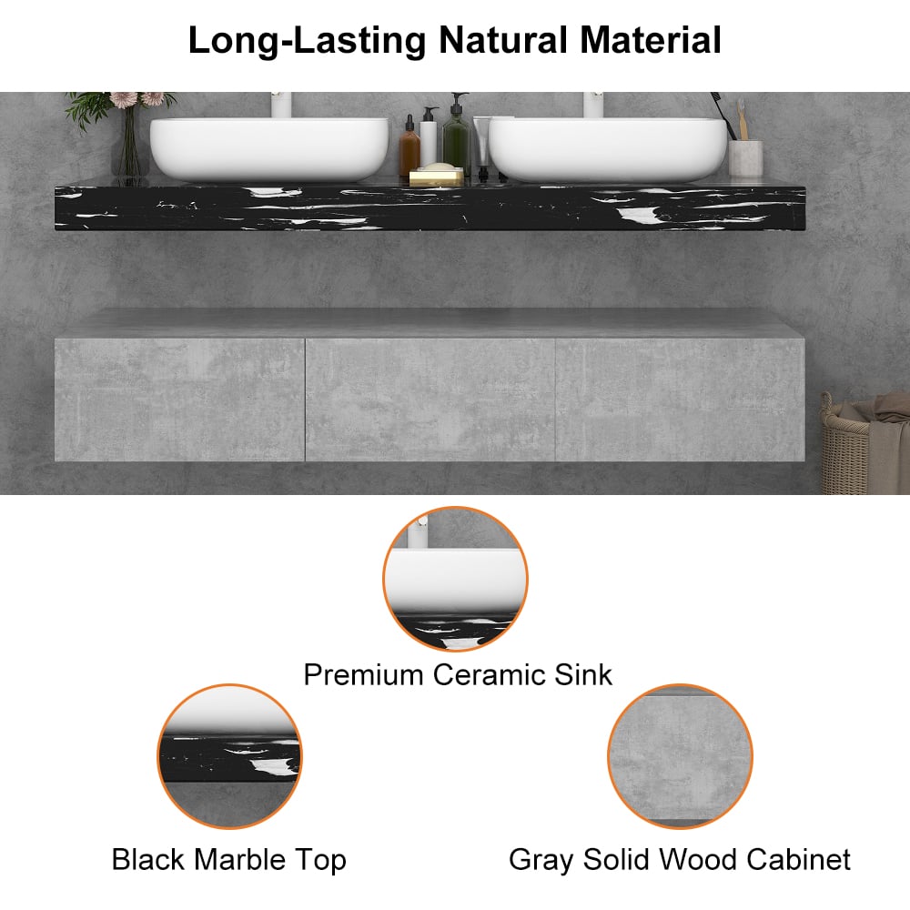 Bathroom vanity with black marble top, gray cabinet, and white sinks.