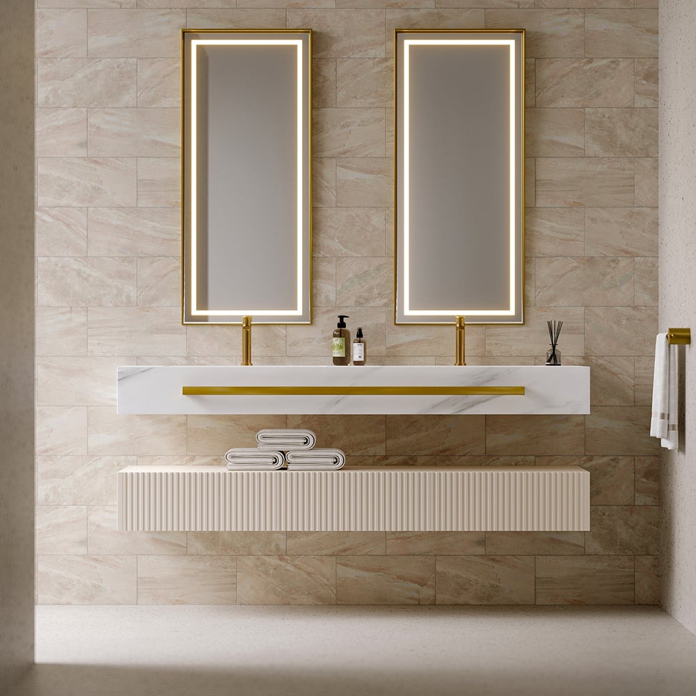 Bathroom vanity with two mirrors and a sink on a tiled wall.