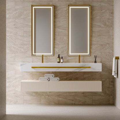 Bathroom vanity with two mirrors and a sink on a tiled wall.
