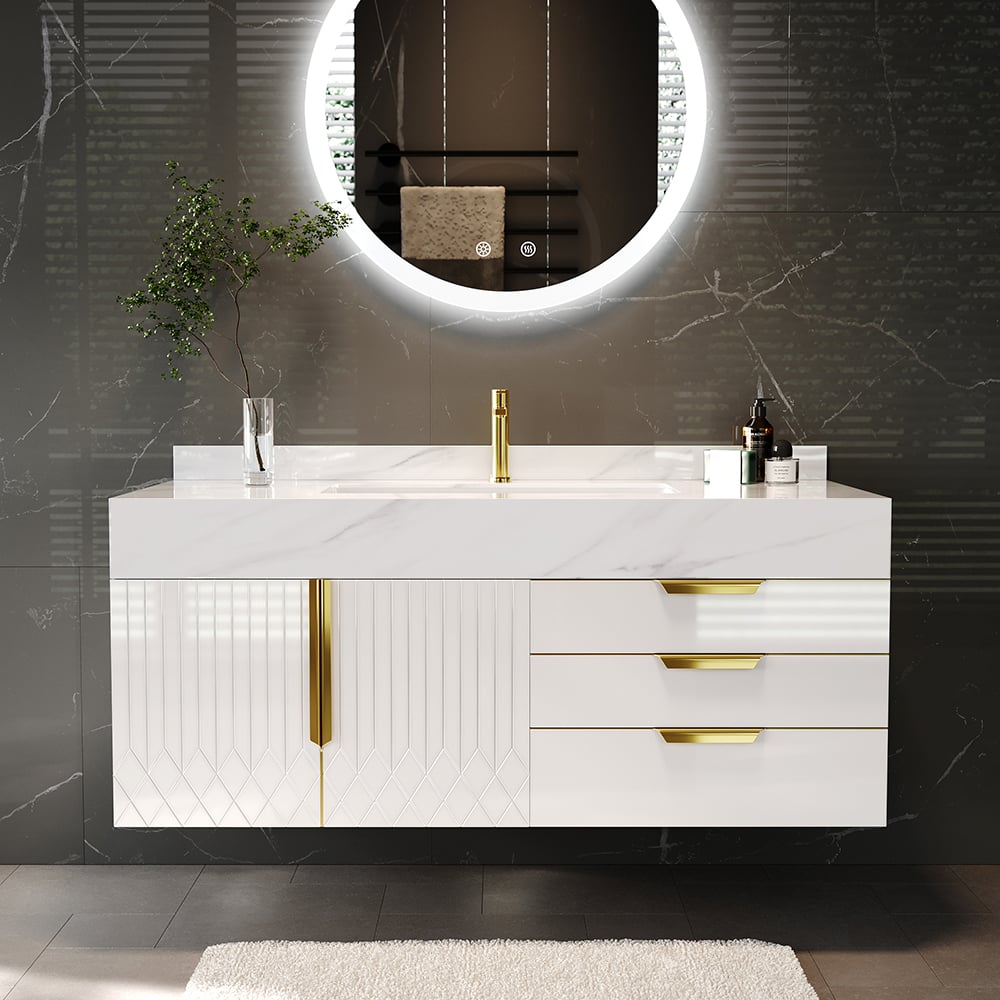 Bathroom vanity with white countertop, gold fixtures, and round mirror on a dark marble wall.