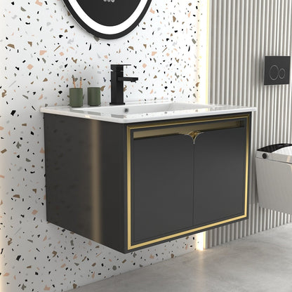 Bathroom vanity with black and gold cabinet, white countertop, and decorative wall tiles.