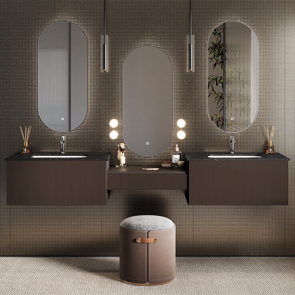 Bathroom setup with three mirrors, two sinks, and a stool against a textured wall.