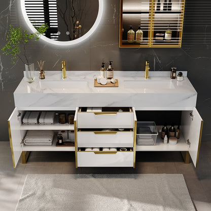 Bathroom vanity with marble countertop, gold fixtures, and various toiletries.