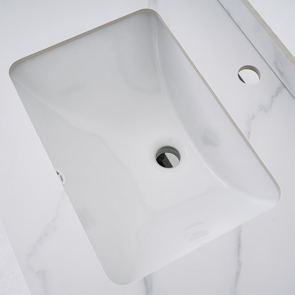 Rectangular white ceramic sink on a white background