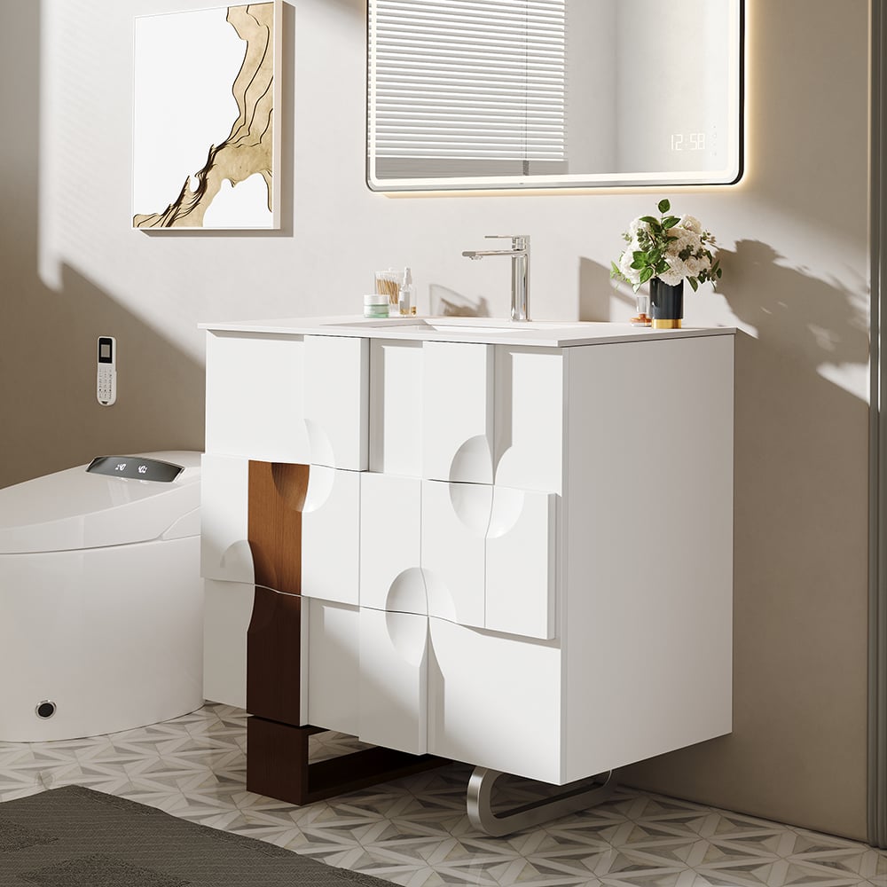 Modern bathroom with a white vanity, mirror, and toilet.