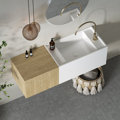 Bathroom setup with a white sink, wooden cabinet, and decorative elements.