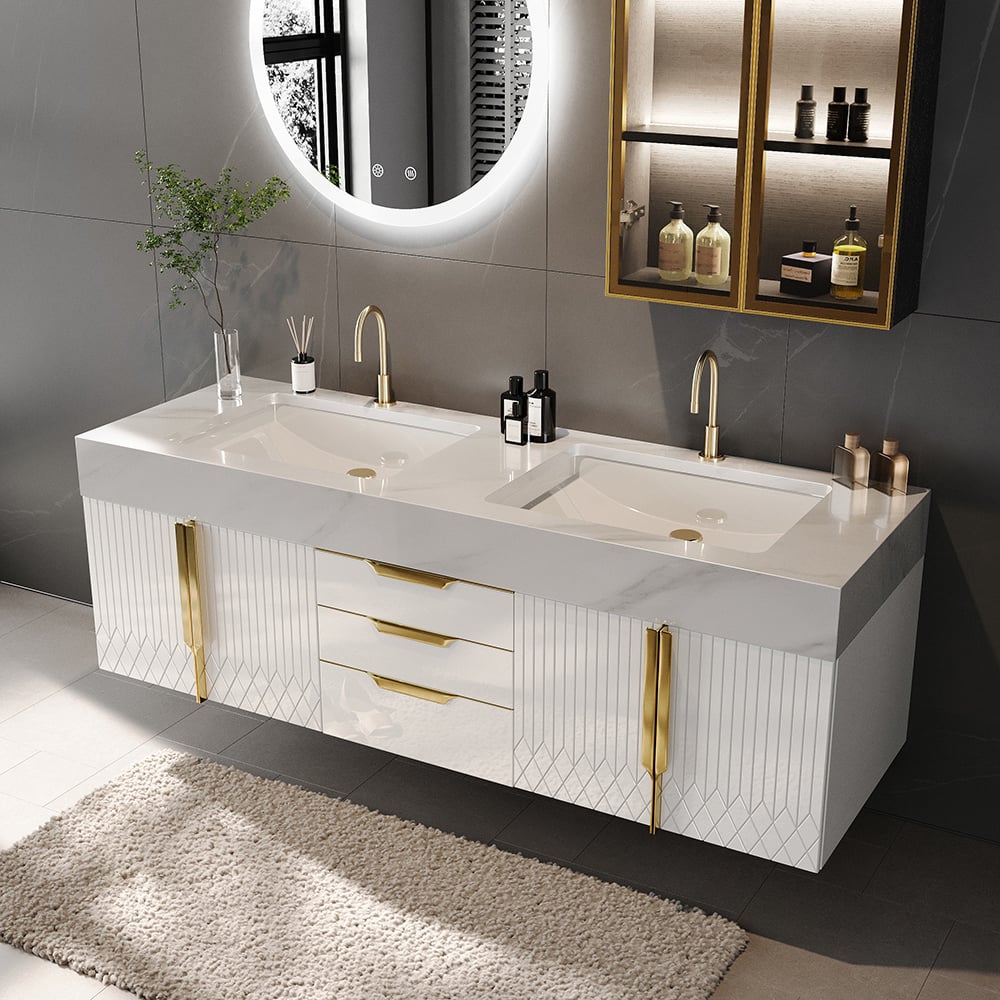 Bathroom vanity with white countertop, gold fixtures, and round mirror.