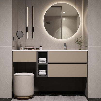 Modern bathroom vanity with round mirror, sink, and decorative elements.